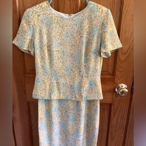 Maggy London 100% silk knee-length dress with peplum.  Fully lined. Size 4.